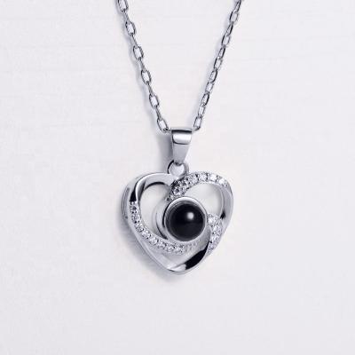 China AZL Romantic I Love You 100 Tongue Picture Heart Shape Necklace Black White Gold Plated Pendant Custom Jewelry 18K for sale