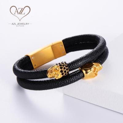 China Environmentally Friendly Fashionable Stainless Steel Skull Black Zircon Magnetic Leather Bracelet Men for sale