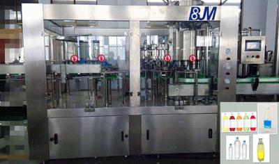 China 4 In 1 500ml PET / Glass Bottle Rotary Liquid Filling Machine For Carbonated Drink for sale