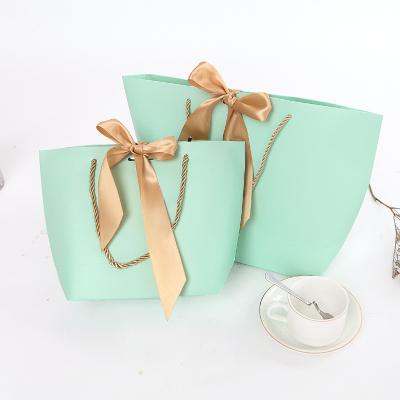 China Wholesale Customized Recyclable Printing Gold Logo Paper Gift Wedding Paper Bag Hot-Stamping Logo Luxury for sale