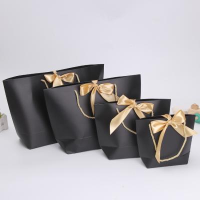 China Recyclable Wholesale Custom Clothing Lip Gloss Gift Paper Bag Packaging Bag With Custom Logo for sale