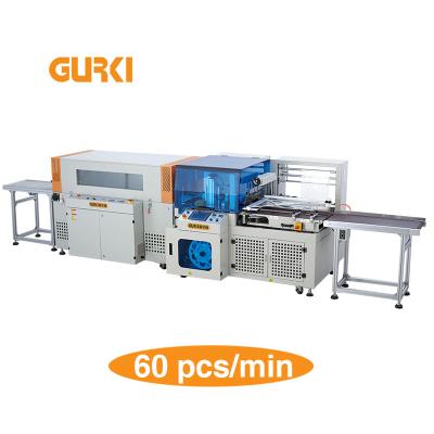 China Stainless automatic food hand heat shrink food pof pe film wrap packing machine sealers shrink tunnel with L bar sealer for sale