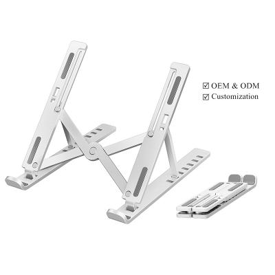 China (Size) 006 Ergonomic Foldable Laptop Stand Portable Height Adjustable Plastic Flexible Folding Adjustable Laptop Stands Light Weight for sale