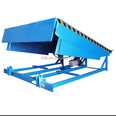 China Building Material Shops Industrial Ramp Automatic Loading And Unloading Platform Hydraulic Pump With Motor for sale