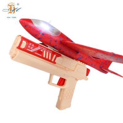 China Outdoor Toy Catapult Toy Kids 2 In 1 Gun Toys Shooting Games With EVA Toy And Target Light Plates Set for sale