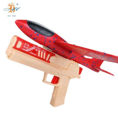 China Catapult Toy Kids Outdoor Toy 2 in 1 Guns Shooting Games Gun Toys with Flat EVA Toy and Target Set for sale