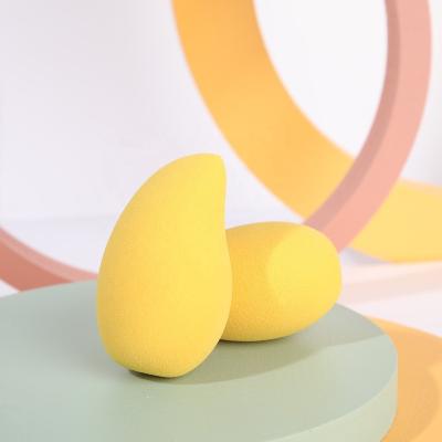 China Beautiful ECO Non-latex Mango Shaped Yellow Sponges Low-end Vegan Makeup Sponge Hydrophilic Custom Logo Blast MOQ for sale