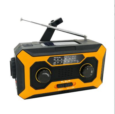 China LCD Show Outdoor SOS Alarm Battery Display Time Radio Hand Crank AM FM Portable Solar WB with LED Flashlight 4000mAh for sale