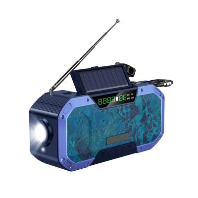 China portable crank am dynamo lcd dynamo solar fm switch kit solar radio with led flashlight for sale