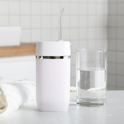 China ABS elektrische tand mini waterflosser ultralicht 165 ml lithiumbatterie Te koop