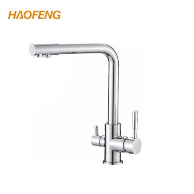 China Modern Brass Double Handle Gold 3 Way European Kitchen Faucet for sale