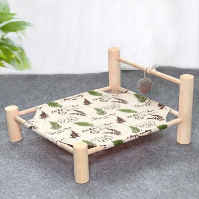 China 2022 New Design Cheap Cooling Pet Bed For Dogs Comfortable Wooden Canvas Pet Bed Outdoor Travel Pet Cradle for sale