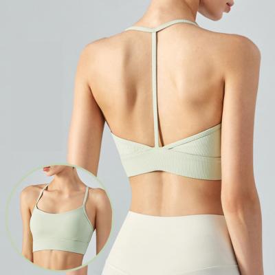 China Breathable T-back Sports Underwear Women Halter Neck Yoga Wear Vest with Chest Pad Fitness Top Beauty Back Bra for sale