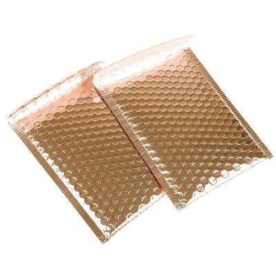 China Strong Adhesive Newly Arrived Po+pe Bubble Bag Can Be Customized Bubble Mailer Gold Foil Coated Bag Design for sale