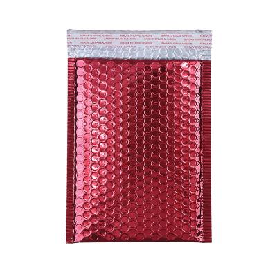 China Strong Adhesive Delivery Wholesale Retail Packaging Amplop Adhesive Aluminized Light Red Bubble Mailers for sale