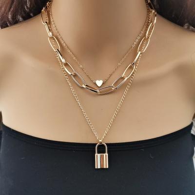 China Fashion Trendy Multilayer Chain Woman Heart Peach Vintage Necklace Set Sexy Pendant Necklace for sale