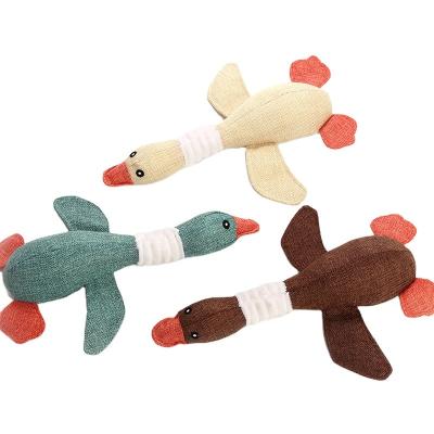 China Stuffed& plush toy pet toys squeaky chew toys plush goose train pet squeak toys for sale