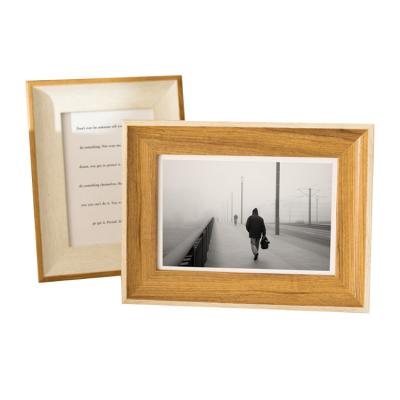 China Creative Simple Engraved Solid Wood Photo Picture Frame Wooden Wall Hanging Frame for sale