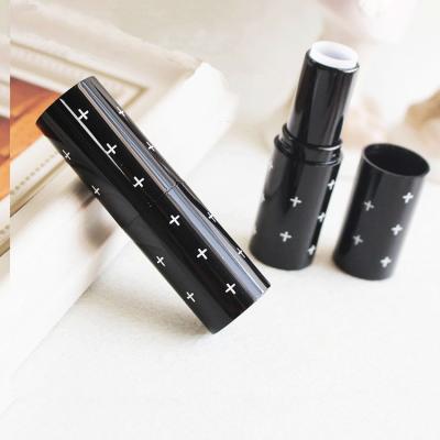 China Cosmetics 12.1mm Gauge ABS Material Plastic Cosmetic Packaging Tube For Black Lipstick Tube Container Empty for sale