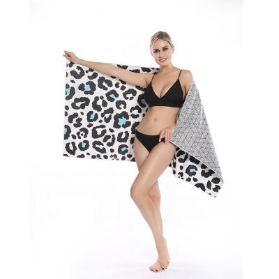 China Low MOQ New Design 80cm*160cm Compressed Quick Dry Beach Towel Beach Mat Yoga Mat Towel Free Leopard Printing for sale