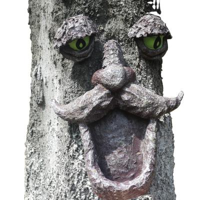 China Handcrafted China Resin Bird Feeder Tree Face with Glow in the Dark Eyes, Fun Leaf Tree Face Bird Feeder for Outdoor Tree Decoration for sale