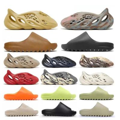 China Anti-Smell Men Sandals Custom Slippers Outdoor Slides Fails Yeezy Flat Slides Ladies Slippers Slides Bone Resin Desert Sand Foam Runner for sale