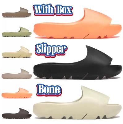 China 2022 New Women's Yeezy Slippers Soft Sole Support Custom Anti-odor Couples Sandals Washboard Bathroom Slippers for sale