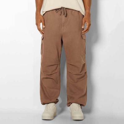 China 100%Cotton Hip Hop Anti-Wrinkle Drawstring Wide Leg Cargo Pants Mens Loose Cargo Pants for sale