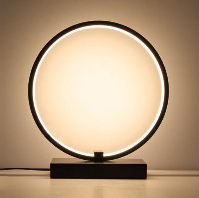 China Amazon ebay Zhongshan wholesale modern simple warm white 2700K circle lighting bedside led table lamp for sale