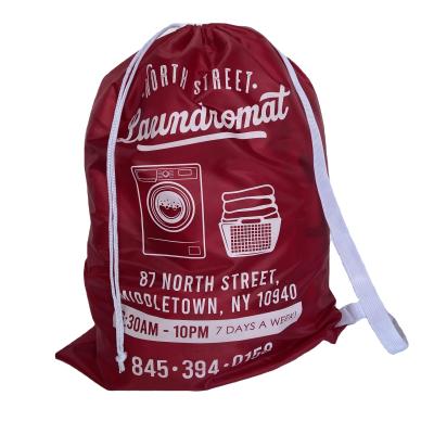 China Large Capacity Home Use Drawstring Dry Cleaning Polyester Modern Laundry Bag Eco Friendly Red Laundry Bag With Strap for sale