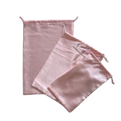 China Wholesale soft luxury wig package bag luxury pale pink satin bag luxury satin striped jewelry pouch with custom logo for sale