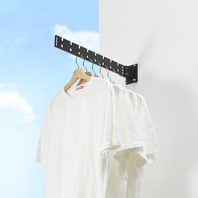 China Wholesale Hotel Wall Mounted Folding Clothes Rack Retractable Clothes Rod Home Laundry Drying Rack Space Saving for sale