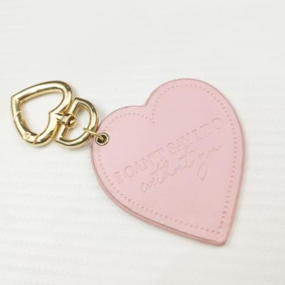 China Daily Design Leather Key Ring Round Circle Saffiano Tassel Key Chain Customized for sale