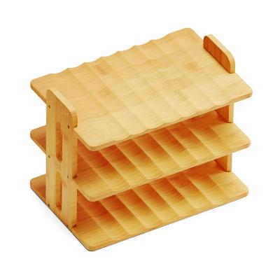 China Stocked Heavy Duty Bamboo Tableware Rack For Bottles 500ml Water Bottle Rack for sale