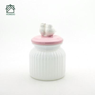 China Minimalist Food Storage Bottle Jars Type Glass Jar With Decorative Ceramic Lids for sale