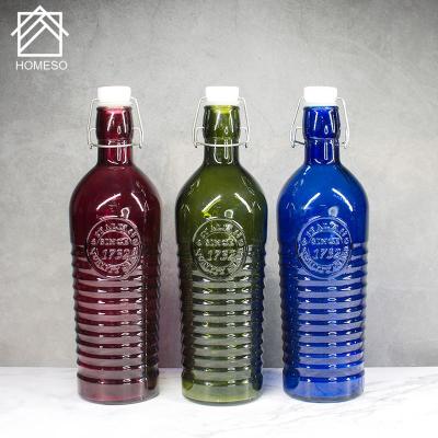 China Wholesale Custom High Quality Metal Clip Stocked Top Glass 1liter Water Bottle for sale