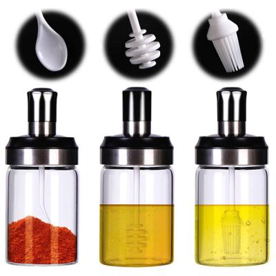 China Stainless Steel Kitchen Seasoning Stocked Glass Tank With Spoon Spice Jar Condiment Tank Bottles With Lids And Spoons for sale