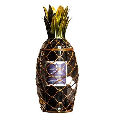 China BEST Eco-friendly Art Wine Rack Home Bronze Decor Metal Pineapple Display Wine Rack Metal Table for sale