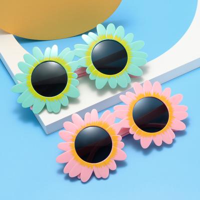 China 2022 sunflower cute sunflower boys and girls sunglasses small children's fashion sunglasses new fashion sunglasses for sale