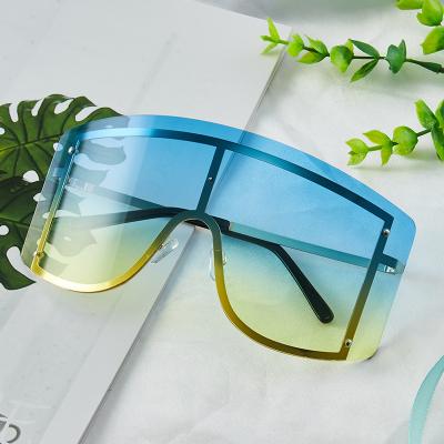 China Fashion Rimless One-Piece Sunglasses New European Stylish Big Frame Sunglasses Women's Fashion Sun-proof One-Piece Sunglasses for sale