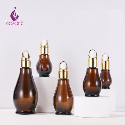 China 100Ml Cosmetic Serum Amber Essential Oil 4 Ounce Hair Oil Squash Make Up Unique Glass Dropper Bottle for sale