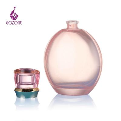 China Clear Iridescent Clear Glass Spray Cosmetic 100ml Perfume Empty Colorful Glass Bottle for sale