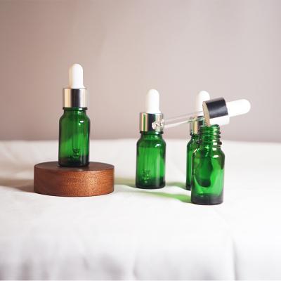 China Wholesale 20Ml 30Ml 50Ml Mini Essential Oil 5Ml Glass Cosmetic Green Clear Bottle With Dropper for sale