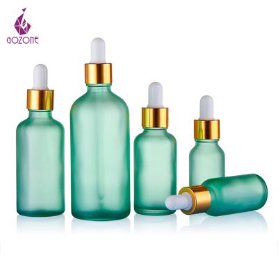 China Cosmetic 100Ml 15Ml Cosmetic Unique Bright Colorful Essential Oil Oil Frosted Empty Glass Bottle for sale