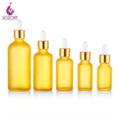 China Cosmetic Green Essential Oil 20ml Frosted Serum Cylinder Gold Supplier 1 Ounce Matte Glass Dropper Bottle for sale