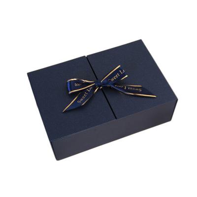 China Recyclable Exquisite double door flip gift box rectangular ribbon bow gift box cosmetics lipstick Packaging box for sale