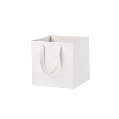 China Recycled Materials Wholesale of paper bags flower shops handbags thickened waterproof square paper bags gift bouquets packaging bags for sale