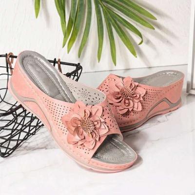 China Fashion Trend Large Size Sandals Flowers Female Woven Wedges Heel Slippers Female External Wear for sale