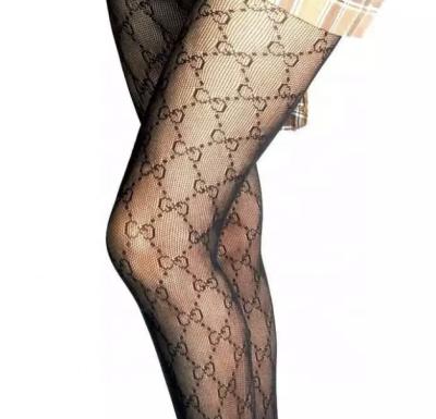 China Factory Direct Antibacterial Customize Brand Logo GG Garbage Net Pantyhose Fashion Women's Popular Tights for sale