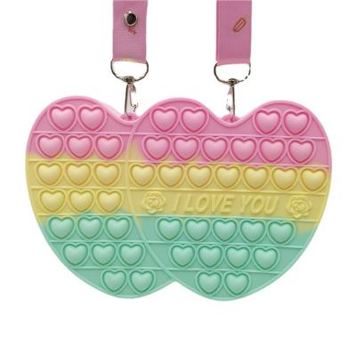 China 2021 hot sale fashion rainbow valentines heart popit child purses and handbags cute silicone pop it purses and purses for sale